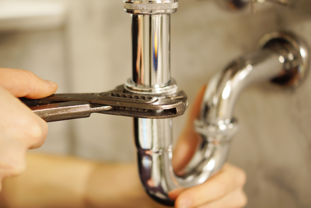Professional plumber at work